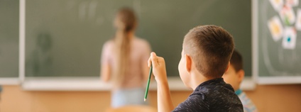 Žáci ve třídě Foto: Depositphotos
